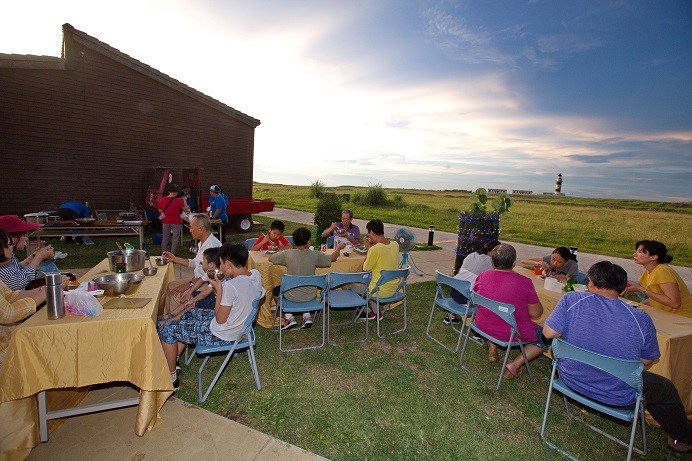 Participants enjoy Mother Earth's Dining Table during the sunset