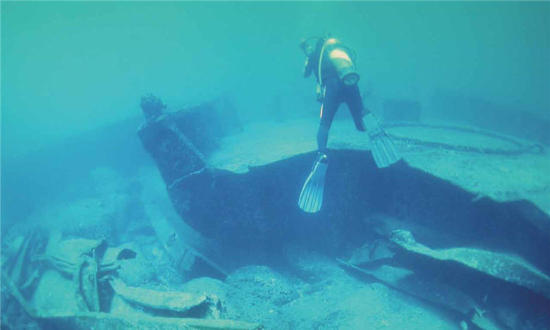 Ke's ongoing love and care for the ocean has lasted for 13 years.In the picture is Ke went underwater to film the wreckage of the Amorgos.